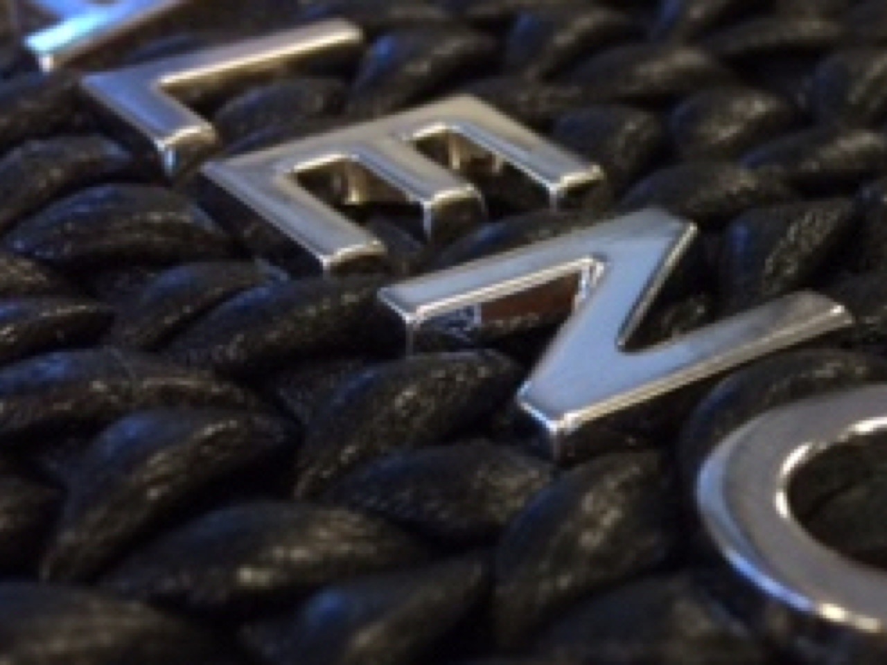 Hand-woven panels with customer logos, also made by the weaving itself.